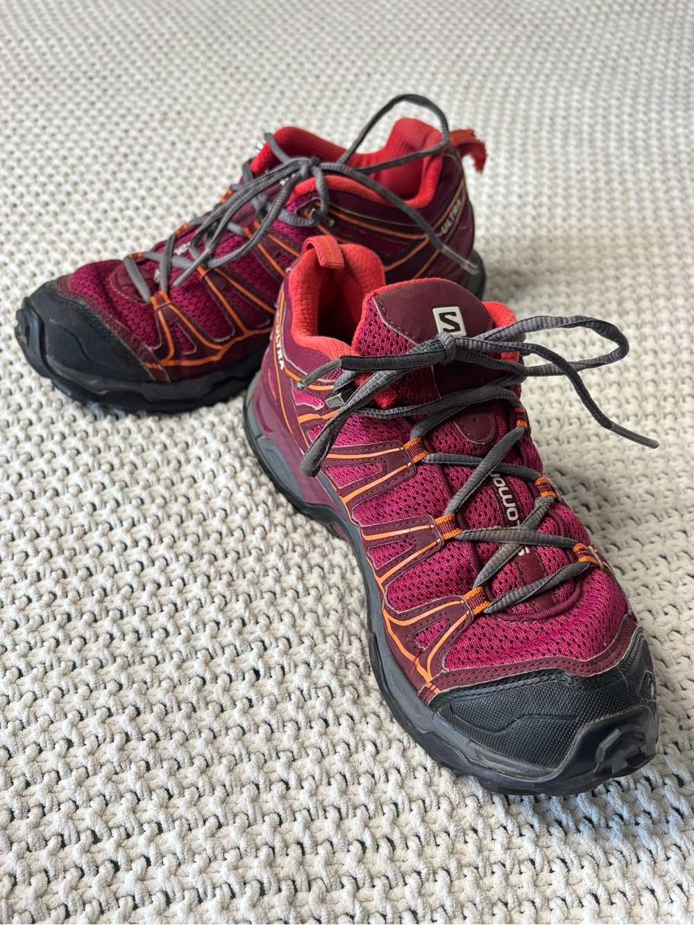 Salomon Trail Shoes in Berry Red with Orange and Black Accents